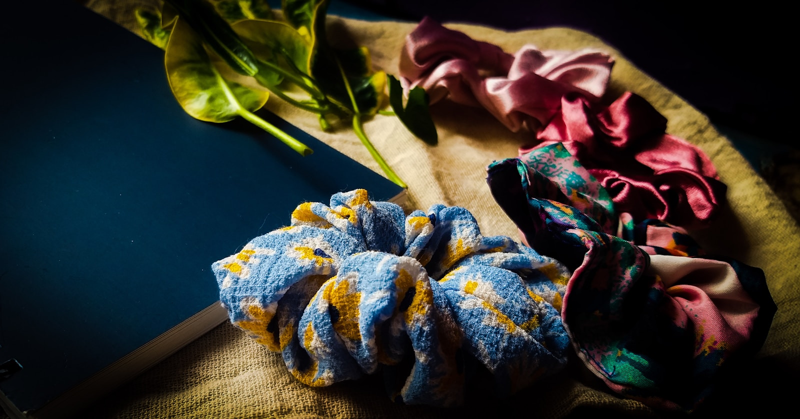 a bunch of hair scrunffs sitting on top of a table